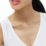 Gold necklace with cross pendant