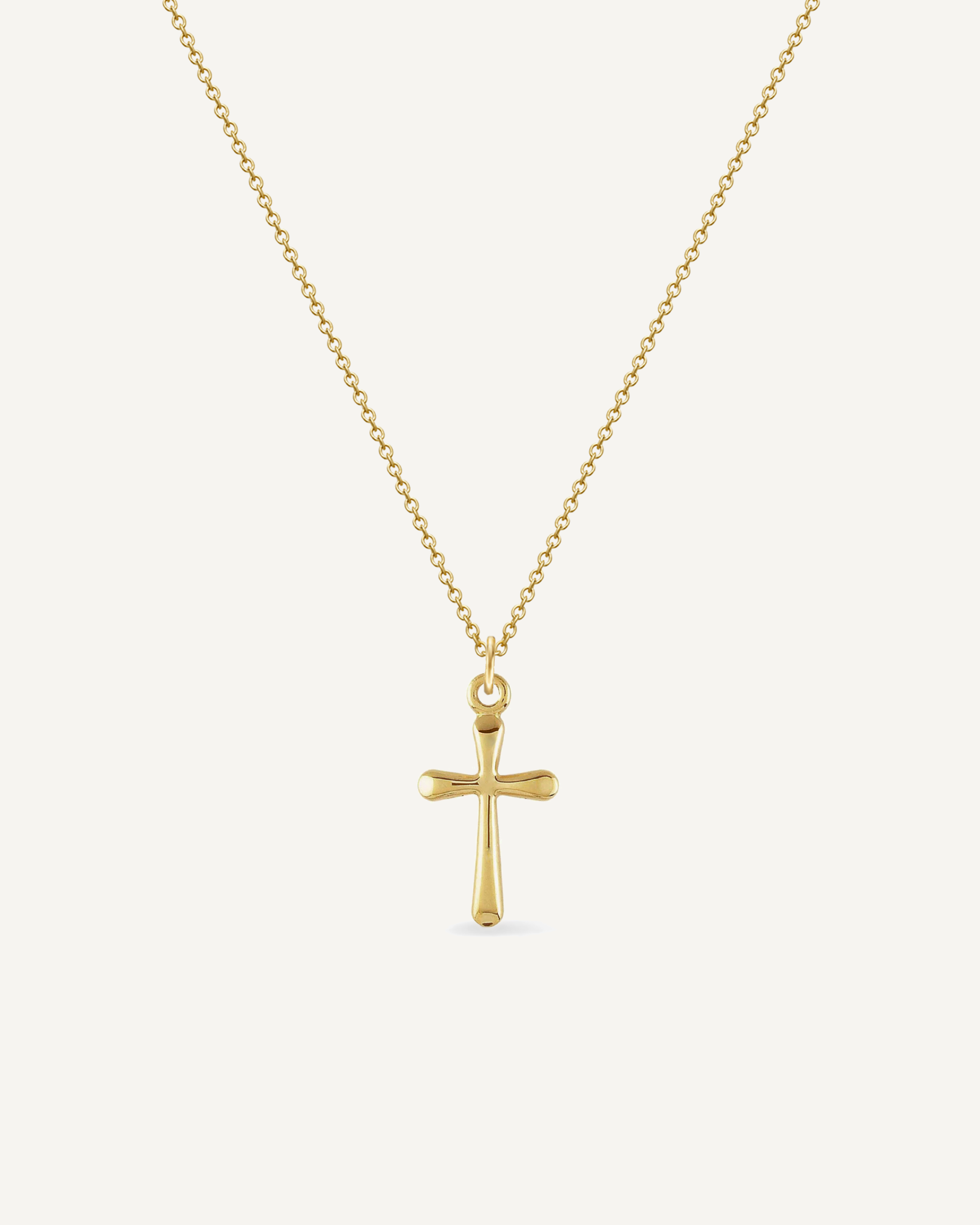 Gold necklace with cross charm