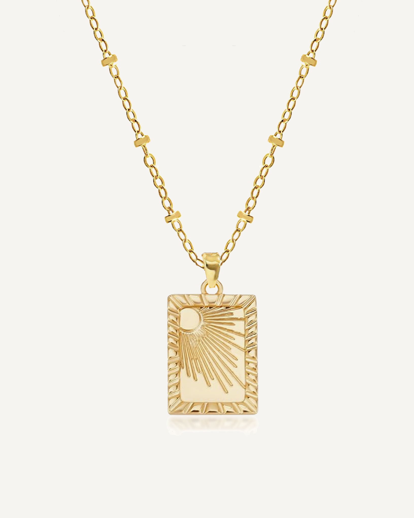 Gold Necklace with a charm of the sun