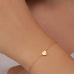 Gold Bracelet with gold heart