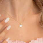 Gold Necklace with white starfish charm